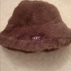 Ugg new brown adjustable, furry hat.